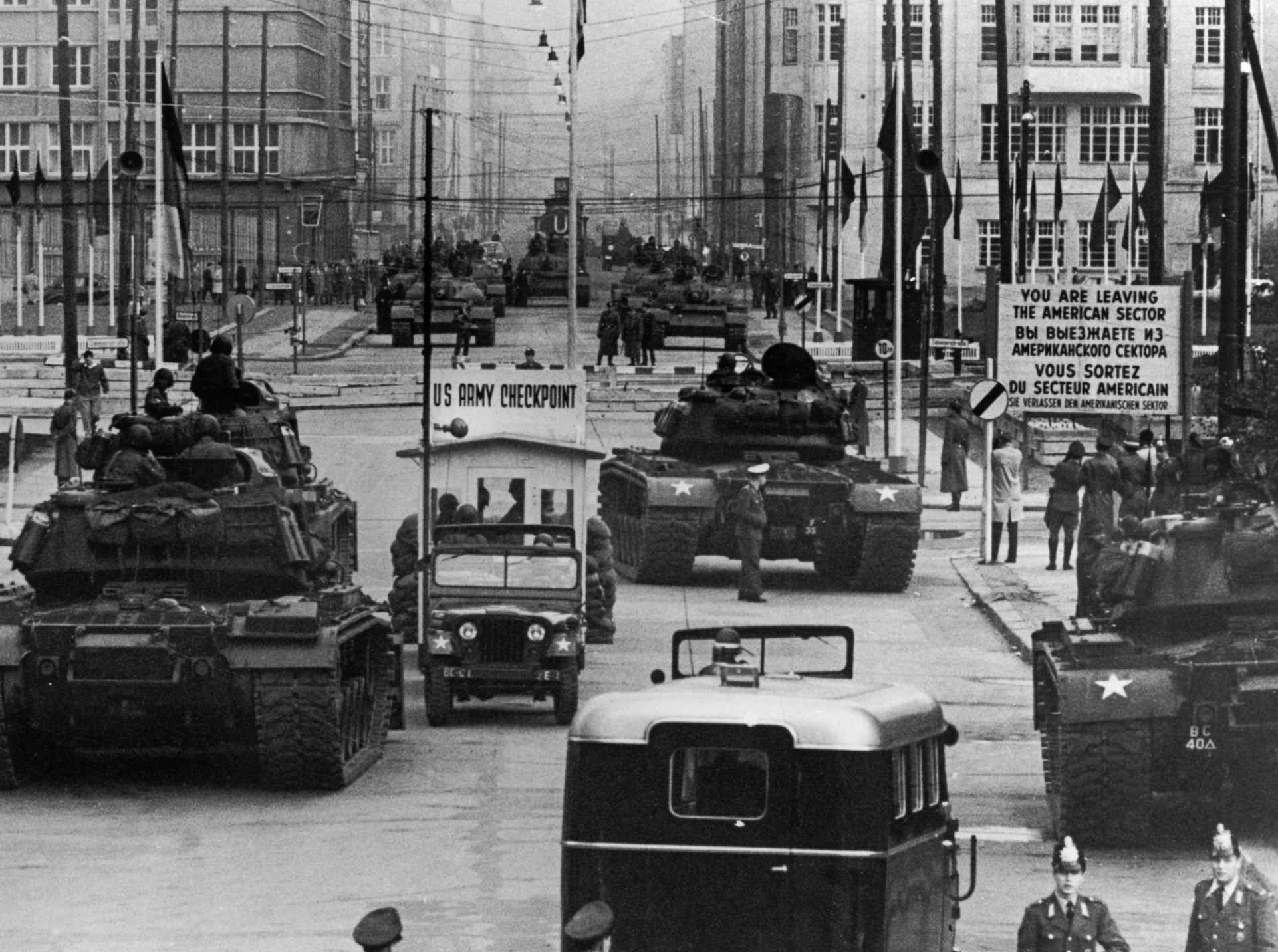 Soviet and American tanks face each other at Checkpoint Charlie during the Berlin Crisis 